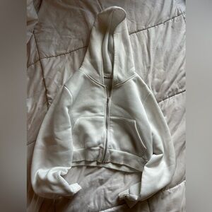 cropped white zip up
